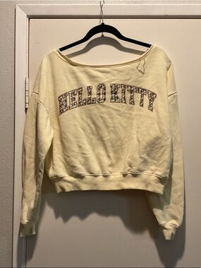 Hello Kitty Off-the-Shoulder Cropped Sweater in Pale Yellow